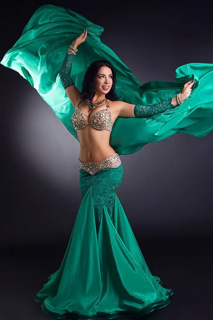Alisia, belly dancer, swirling a green silk veil