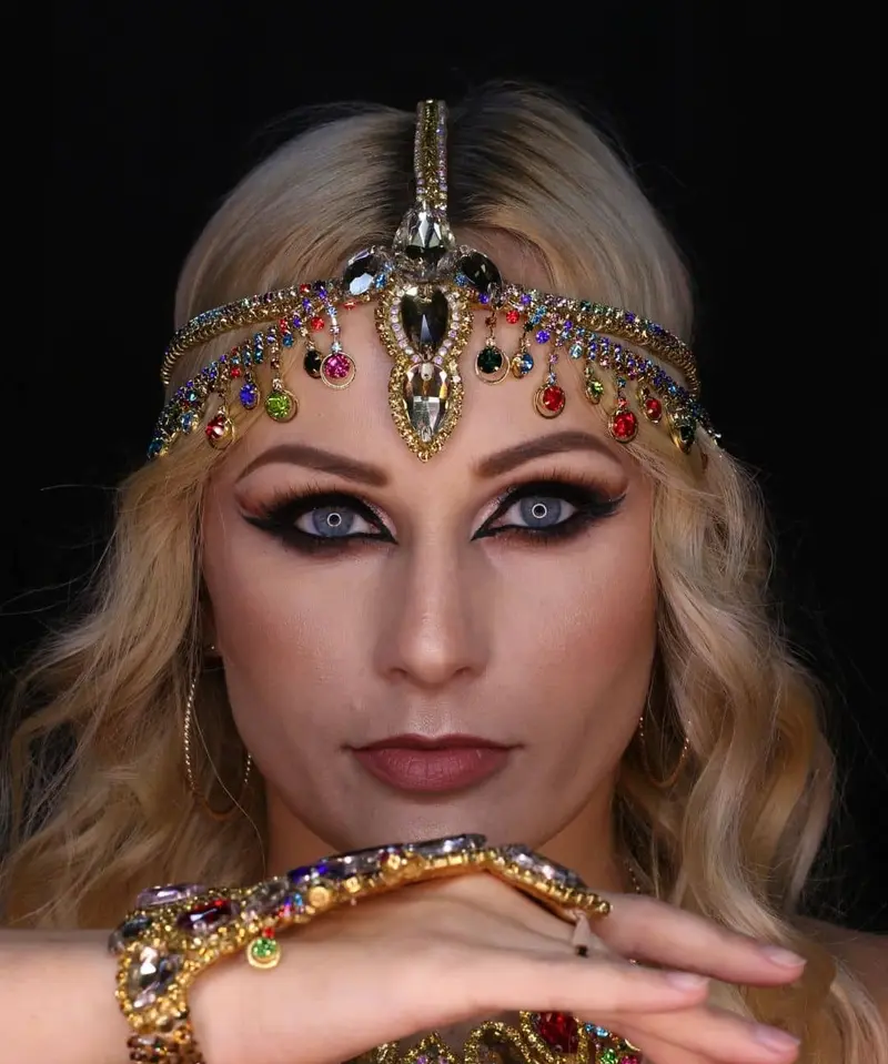 Belly dancer V in a jewelled headpiece, close portrait
