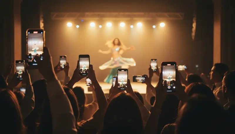 Guests filming a belly dance show on their phones