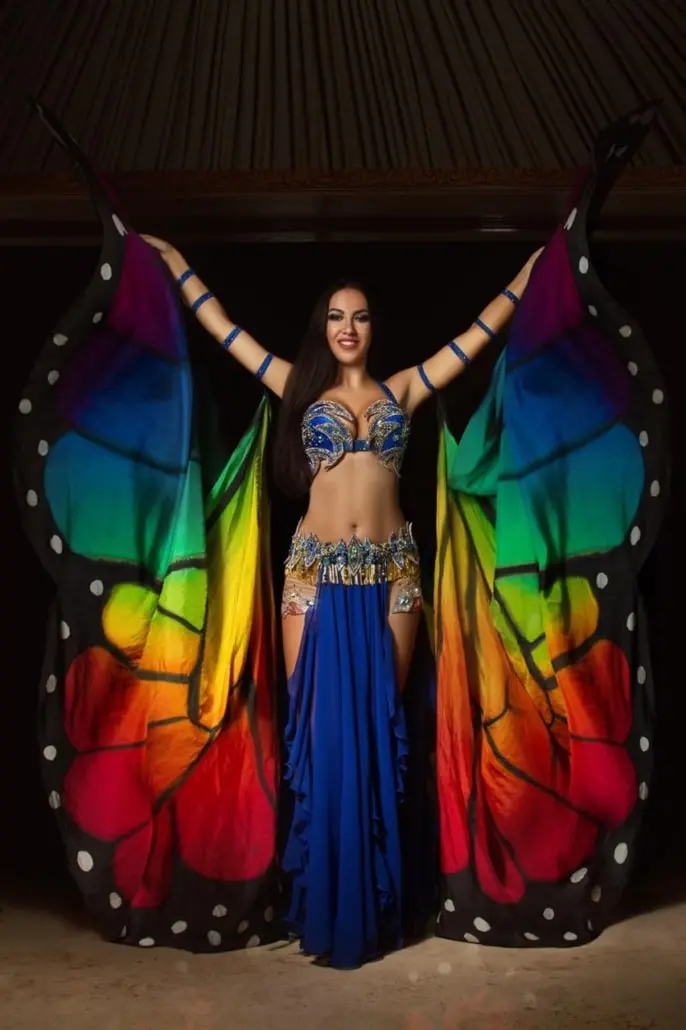 Maria, belly dancer, opening rainbow butterfly wings